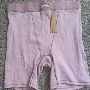 SKIMS Ribbed Biker Shorts in Dusty Rose